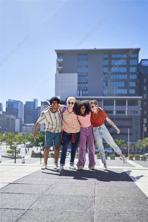 Friends hugging - Stock Image - F037/9633 - Science Photo Library