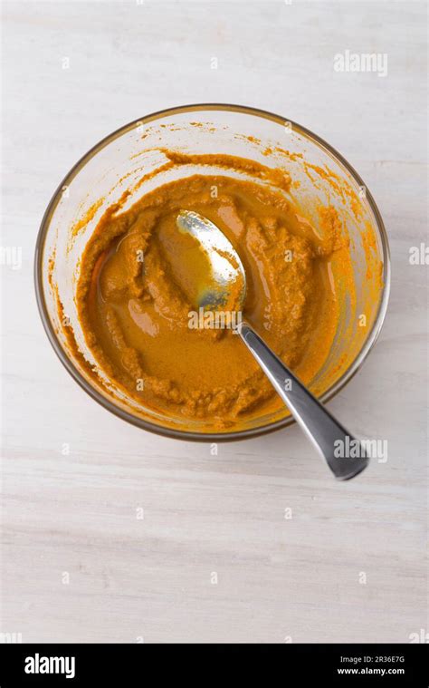 Fresh turmeric paste Stock Photo - Alamy