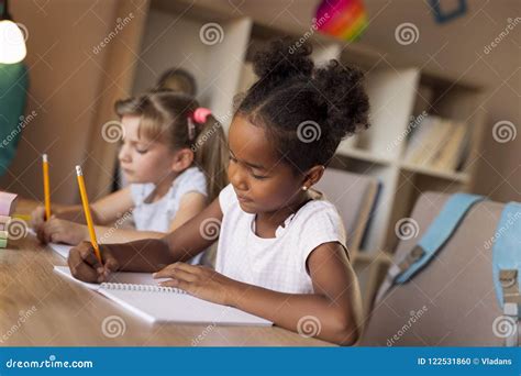 Little Girls Solving Math Problems Stock Photo - Image of home, bookworm: 122531860