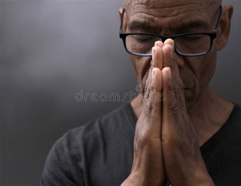 Black Man Praying To God Caribbean Man Praying with Black Background ...