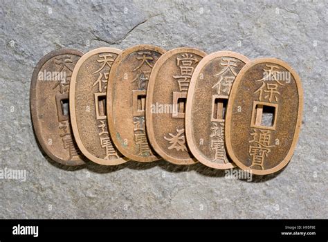 Old Japanese coins Stock Photo - Alamy