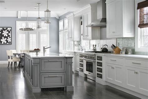 Transitional-design-ideas-with-chandelier-kitchen-island-monochromatic-neutral-pendant ...