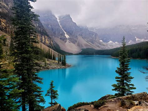 Moraine lake at Banff National Park in Alberta, Canada on a cloudy day ...