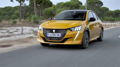 Peugeot 208 GT Line in Faro Yellow Driving Video - YouTube