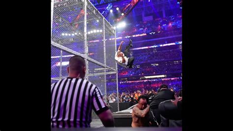 SHANE MCMAHON JUMPS OFF CAGE AT WRESTLEMANIA 32! - YouTube