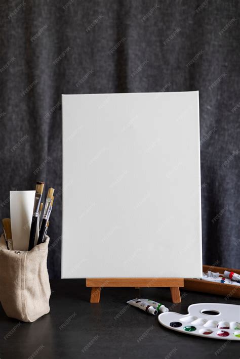 Free Photo | Blank canvas for painting indoors still life