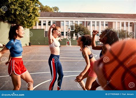 We Won. a Diverse Group of Sportwomen Celebrating Their Win Together after Playing Basketball ...