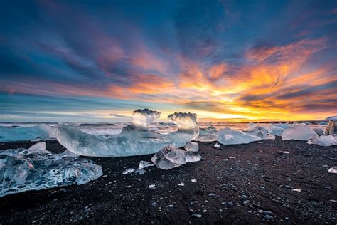 Premium Photo | Diamond black sand beach at sunset in iceland