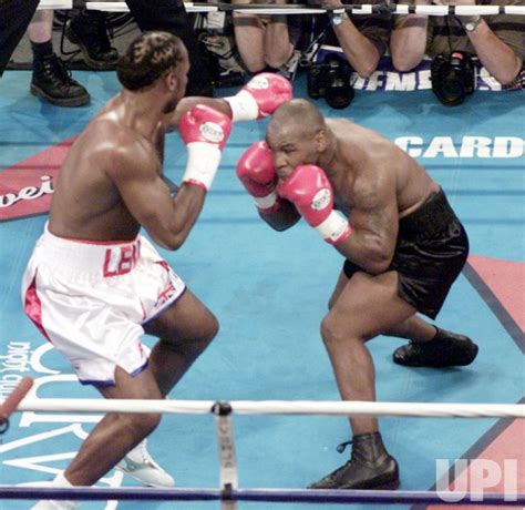 Photo: Lennox Lewis defeats Mike Tyson - - UPI.com