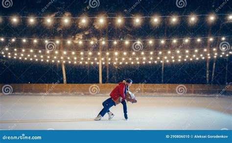 Winter Wonderland: Ice Skating Couple Having Fun on a Magical Evening ...