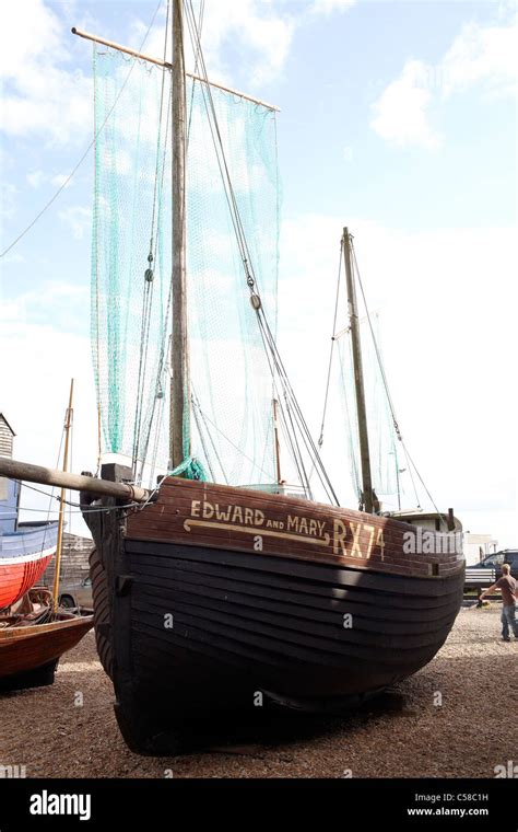 Hastings beach view pebbled pebbles english seaside boat fishing working fishermen fish trawlers ...