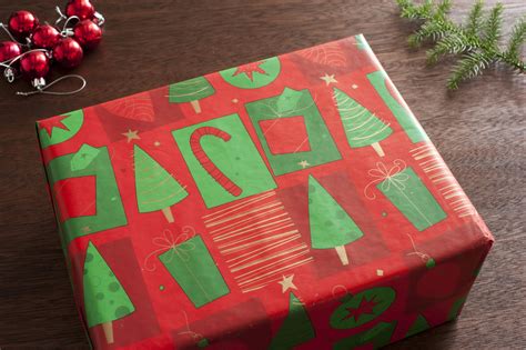 Photo of Beautifully wrapped Christmas present | Free christmas images