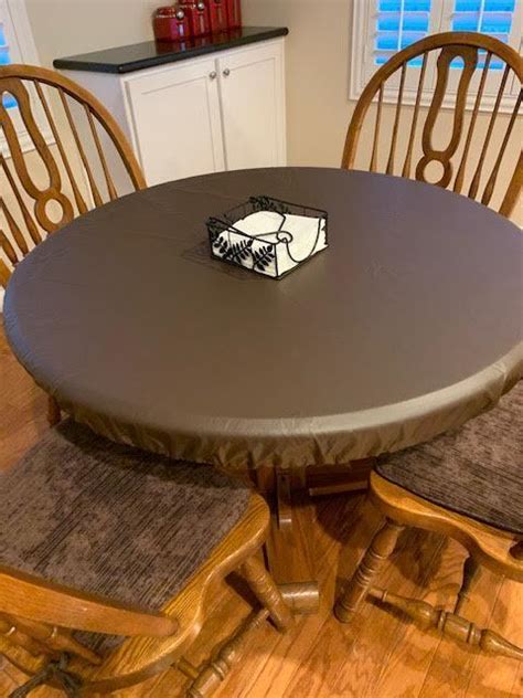 round fitted leather look vinyl tablecloth