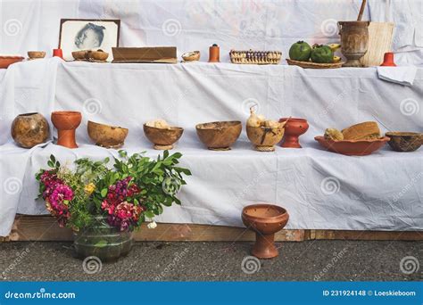 Traditional `dia De Los Muertos` Altar with Food Offerings, Flowers and ...