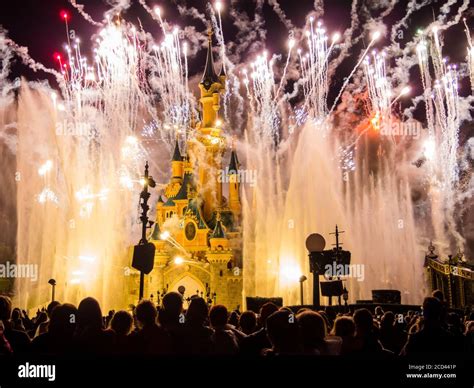 Disneyland Paris, castle with fireworks Stock Photo - Alamy