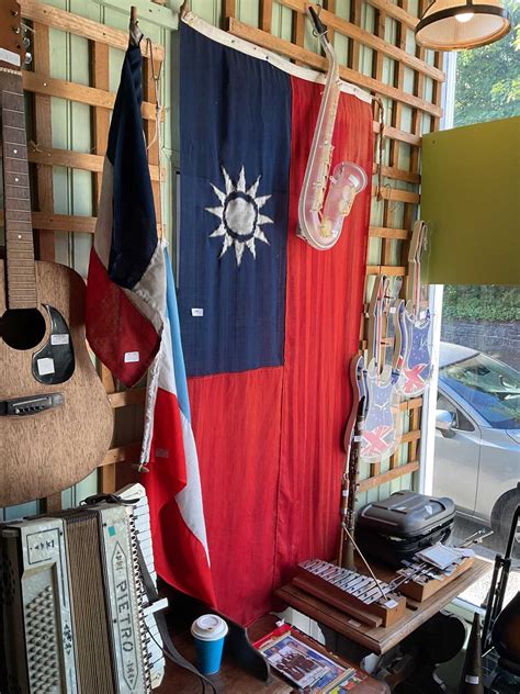 Lot 169 - Three vintage flags, including WWII Republic