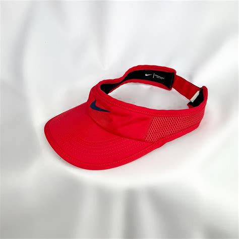 Red Nike Visor ++ Regular fit. Adjustable at... - Depop