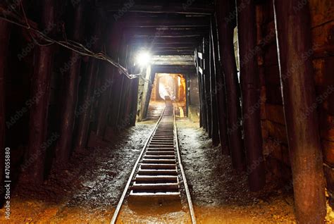 Mine with railroad track - underground mining Stock Photo | Adobe Stock