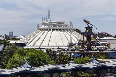 Visitor climbs off Disneyland’s Space Mountain during ride