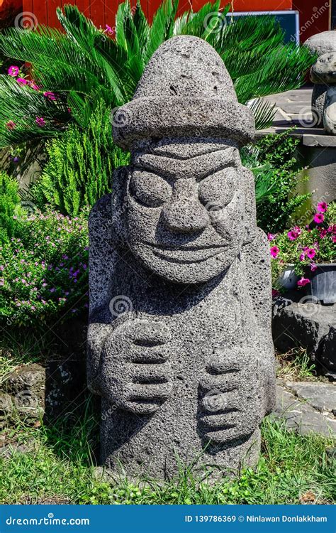 The Harubang Statue At A Park Near The Ocean Of Jeju Island, South Korea Stock Photo ...