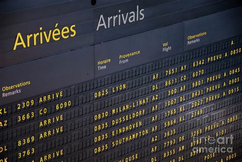 Arrival departure board at airport Photograph by Sami Sarkis | Fine Art America