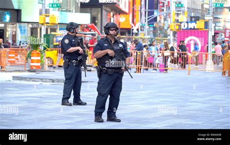 New York City - September 2016: NYPD Swat team officers armed with assault rifles patrol Times ...