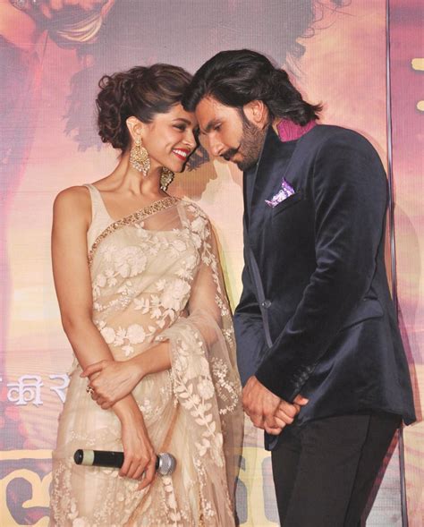 Deepika Padukone and Ranveer Singh posing at film RAM LEELA first look ...