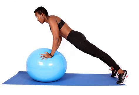 Woman Doing Push Ups Arm Exercise on Swiss Ball