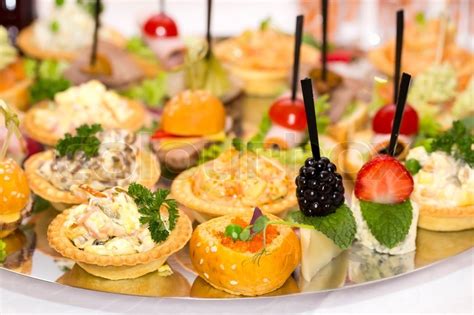 Canapes of cheese vegetables meat and ... | Stock image | Colourbox