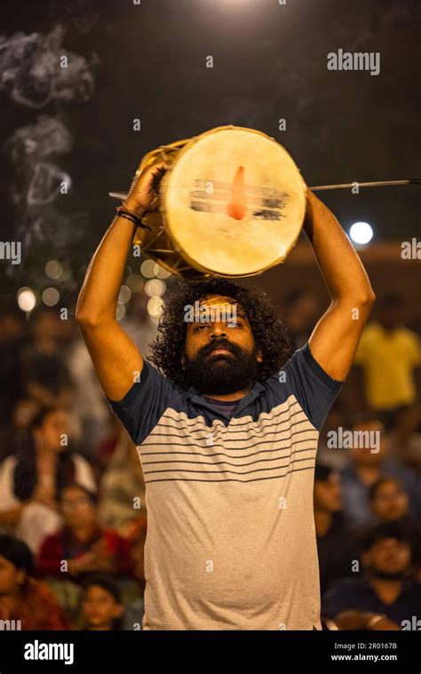 Ganga aarti, Portrait of an young priest performing river ganges ...