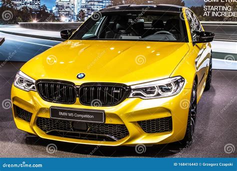 Yellow BMW M5 Competition Sedan at Geneva International Motor Show, F90 ...