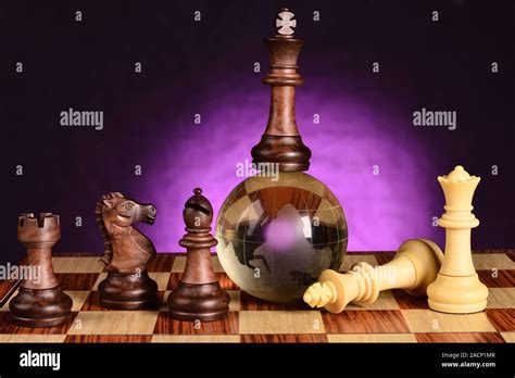 Pieces of chess game on the chessboard Stock Photo - Alamy