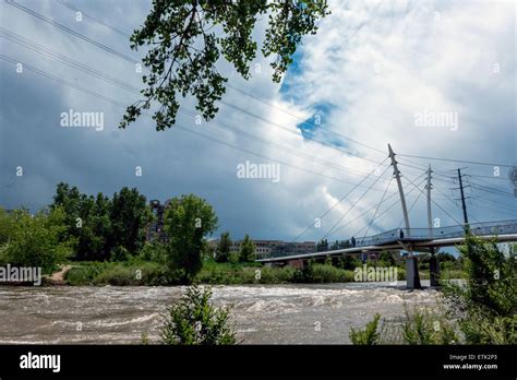 Pedestrian bridge over the South Platte River in Denver Colorado Stock ...