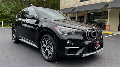 BLACK SAPPHIRE METALLIC BMW X1 WITH PANORAMIC MOONROOF AND BLACK ...