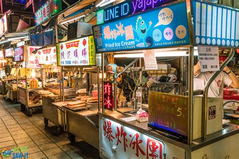 TAIPEI, TAIWAN - JULY 11: This is a street in Shilin night market a famous night market where ...