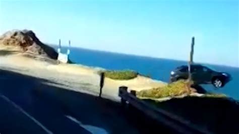 Dashcam footage captures car driving off cliff | CNN