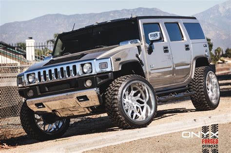 Silver Hummer H2 Outfitted and Ready to Go Off-Road | Hummer h2, Hummer cars, Hummer