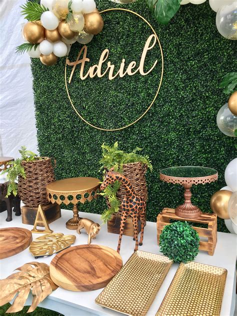 a table topped with lots of gold and white decorations