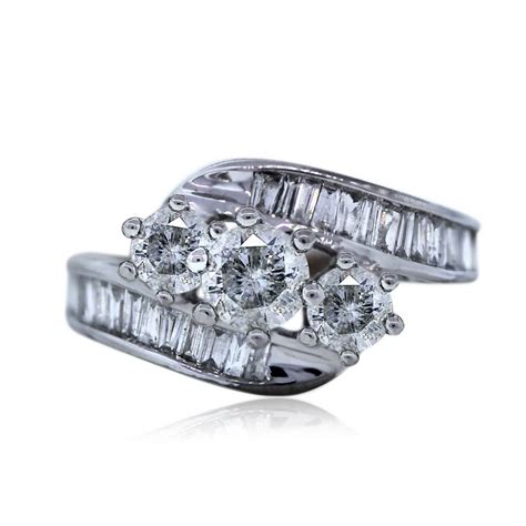 White Gold Three Stone Round and Baguette Diamond Bypass Ring