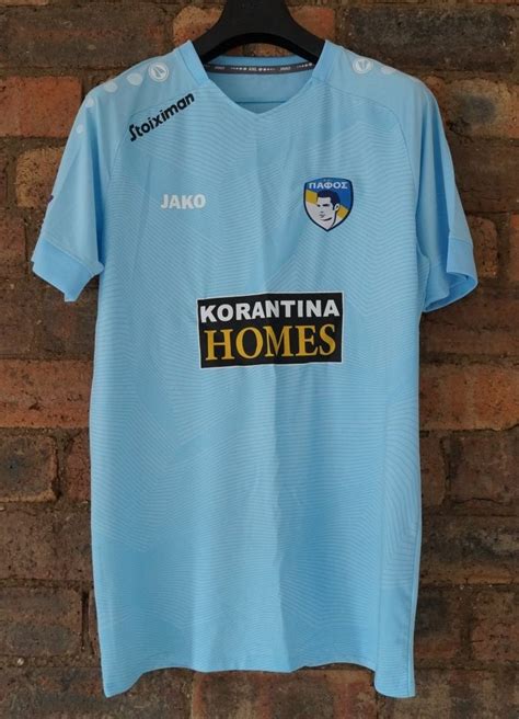 Pafos FC Home football shirt 2020 - 2021. Sponsored by Korantina Homes