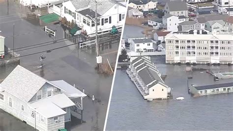 Flood emergency in Hampton Beach, NH, with scores of homes underwater