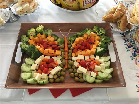 Butterfly Veggie Tray | Veggie tray, Birthday party snacks, Birthday party food