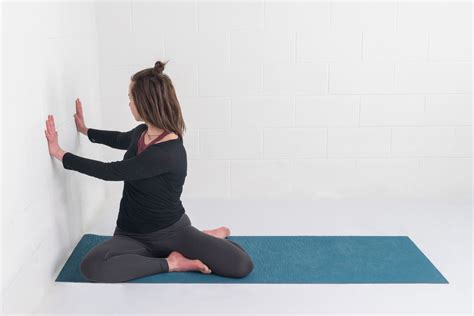 Mindful Twisting: Seated Spinal Twist Pose at the Wall - YogaUOnline