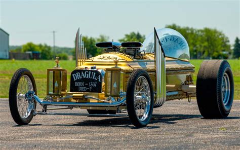 This coffin has been transformed into a four-wheeled V8 Dragula replica ...