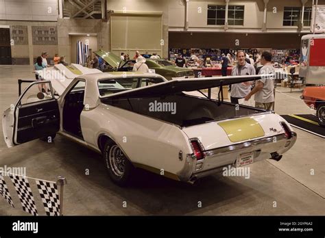 Convention center guests view custom automobiles at the 2021 Ocean City ...