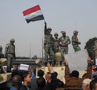 Egyptian soldier waves flag - Tahrir Square | This moment wa… | Flickr