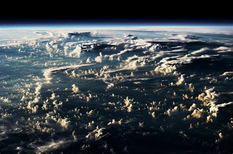 Satellite View Of Clouds Over Earth Photograph by Panoramic Images - Fine Art America