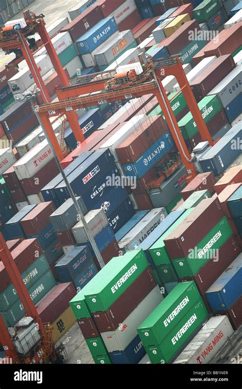 Container ships being loaded in the port of Shenzhen, China Stock Photo - Alamy