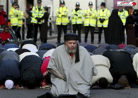 File photograph shows Muslim cleric Abu Hamza al-Masri leading prayers ...