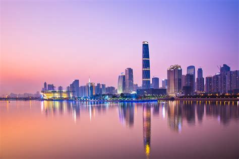 Zhujiang River and modern building of financial district at nigh - China Briefing News